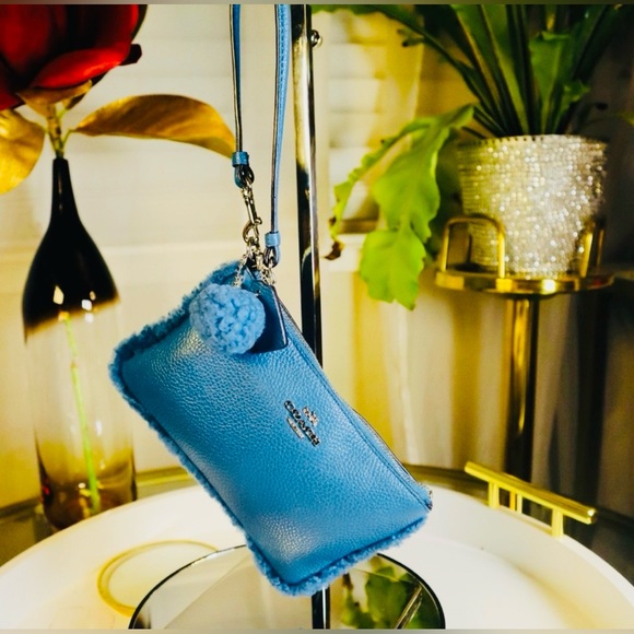 COACH Blue Shearling Pom Wristlet, EUC - Picture 4 of 5